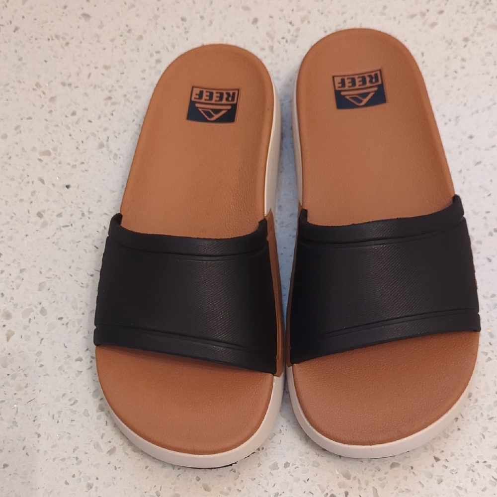 Reef Black Strap Slide Sandals with Brown Footbed